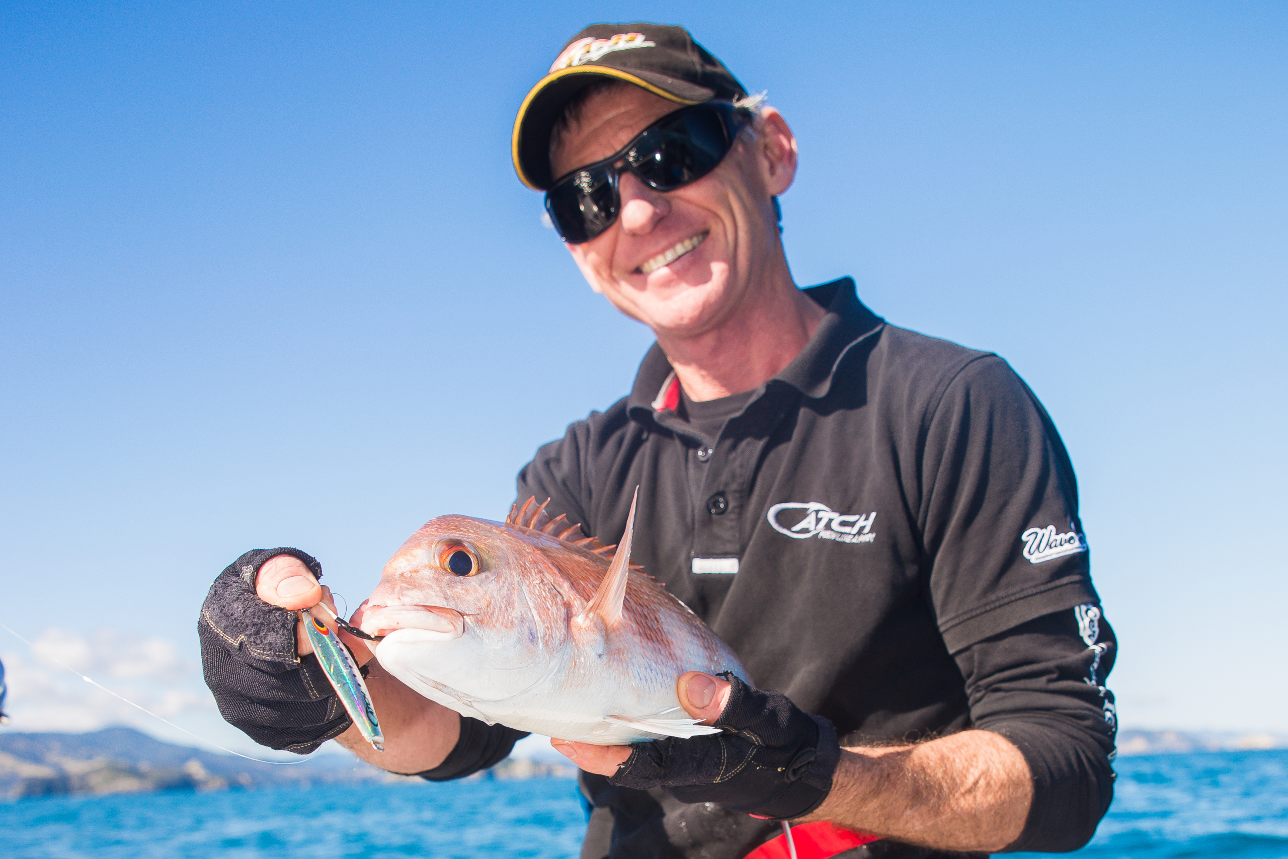 Grant with micro-jig caught snapper