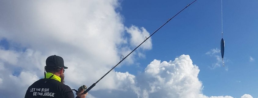 Popper fishing with top-water rod for yellowfin